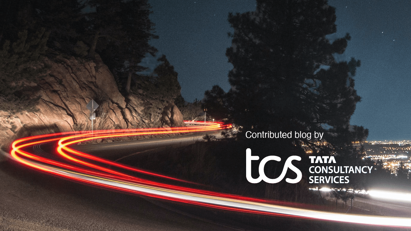 TCS Logo on Time Lapse Traffic Background